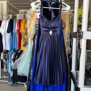 Navy blue satin dress with brooch. Halter tie